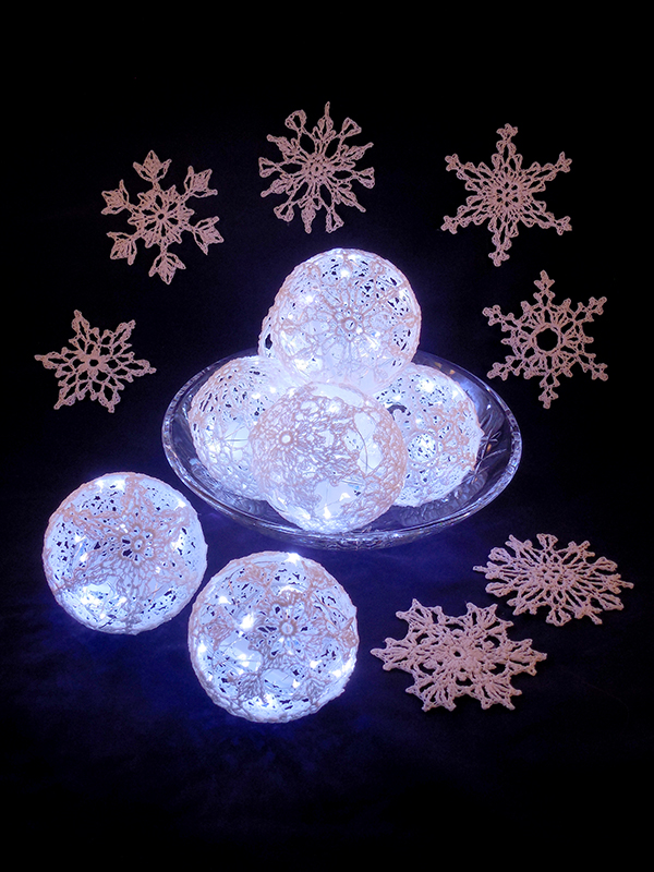 set of crochet snowflake lightballs