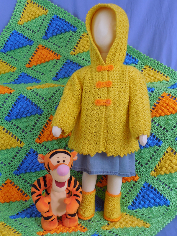 April-themed crochet baby afghan set