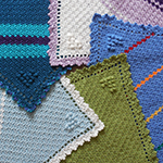 corner-to-corner striped baby afghans with popcorn heart