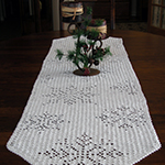 crochet table runner with snowflake design