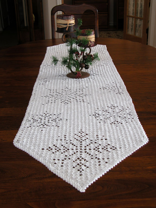 crochet table runner with snowflake design