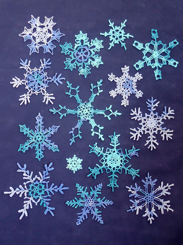 lacy snowflakes crocheted with self-striping thread