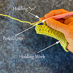 how to hold a crochet hook