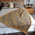 interlocking filet mesh afghan with leaf design