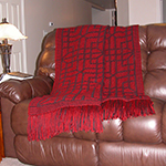 reversible afghan with Chinese lattice design