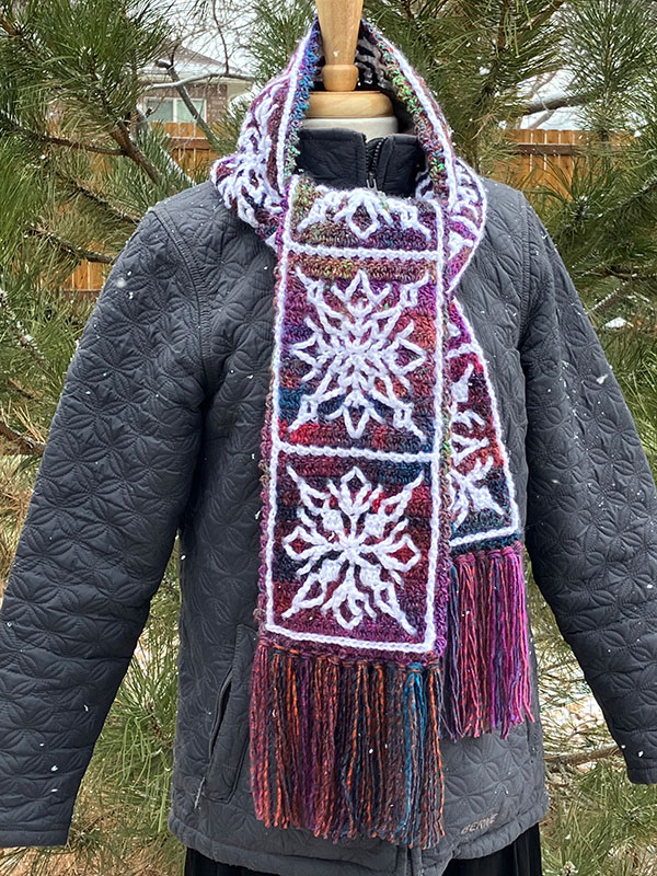 interlocking crochet scarf with snowflake design