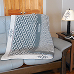 Double overlay mosaic crochet afghan showing the design on both sides.