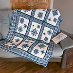 interlocking filet crochet afghan with snowflake design