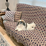 knit-look crochet afghan and pillows