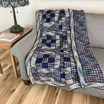 double overlay mosaic afghan with nine-patch quilt design