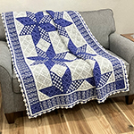 interlocking filet crochet afghan with star flower quilt design