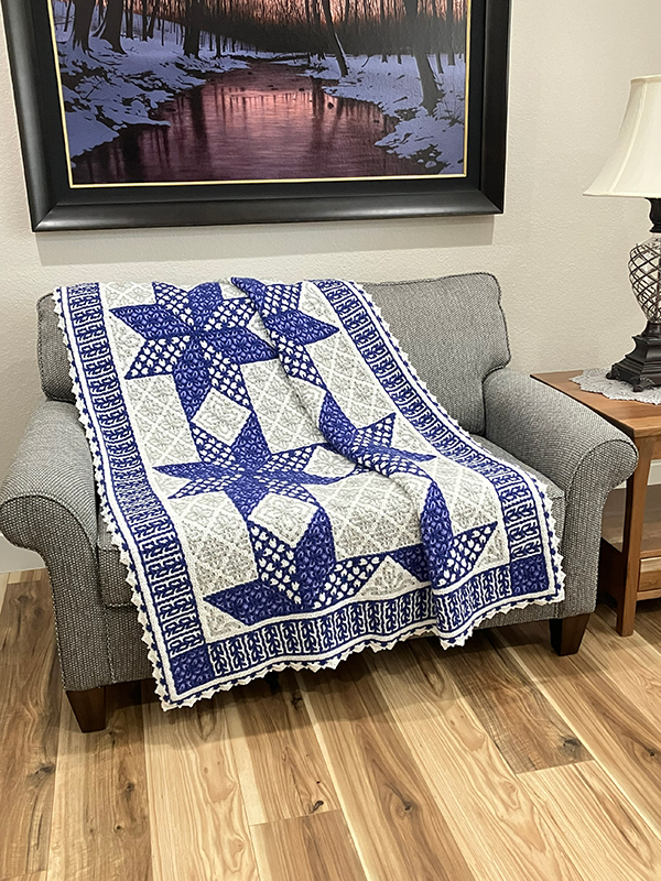 interlocking filet crochet afghan with star flower quilt design