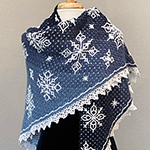 interlocking crochet triangle shawl with snowflake design