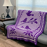 interlocking filet crochet afghan with filet crochet birds design