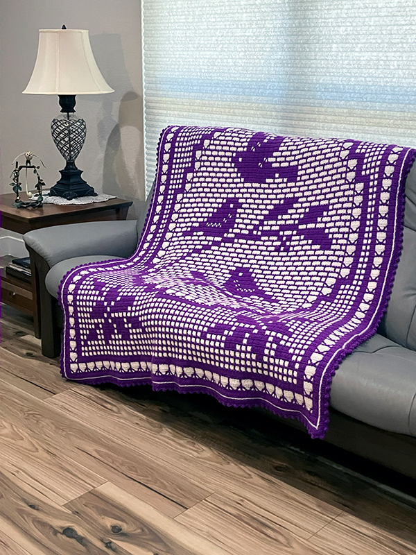 interlocking filet crochet afghan with filet crochet birds design