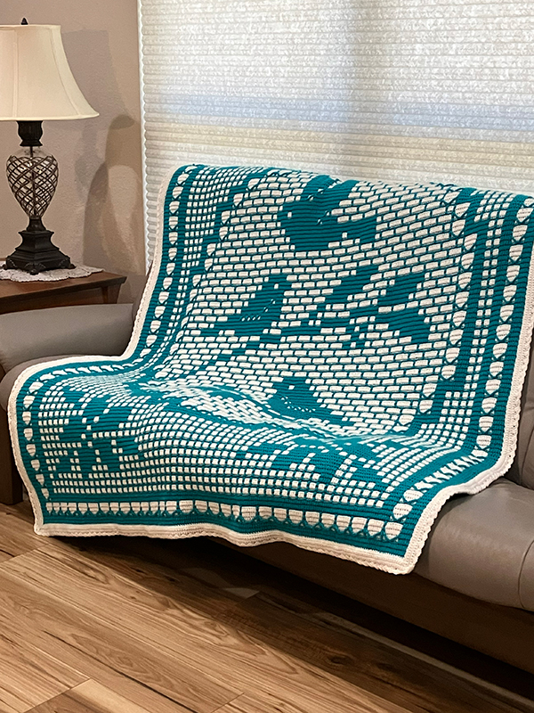 double overlay mosaic crochet afghan with filet crochet bird design